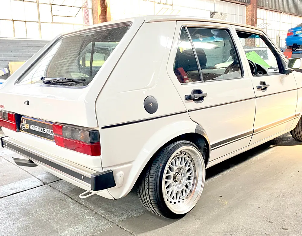 White Volkswagen Golf in the Viper Performance workshop