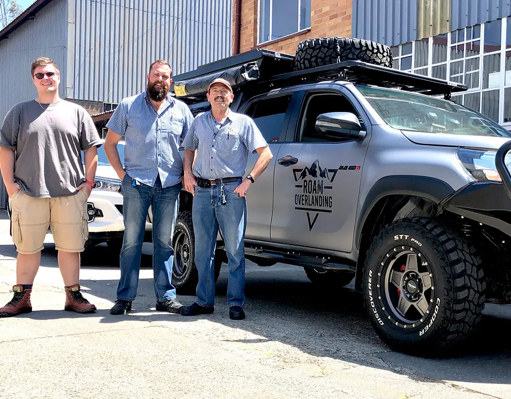 Overland-equipped pickup outside the Viper workshop